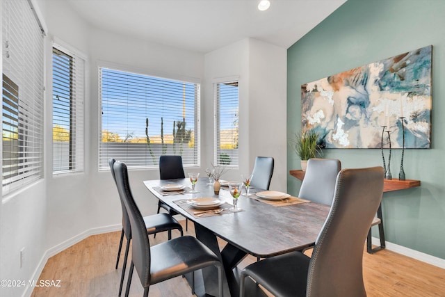 dining area with light wood-type flooring