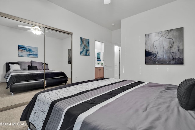 bedroom featuring ensuite bathroom, ceiling fan, a closet, and carpet floors