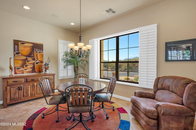 dining room with an inviting chandelier