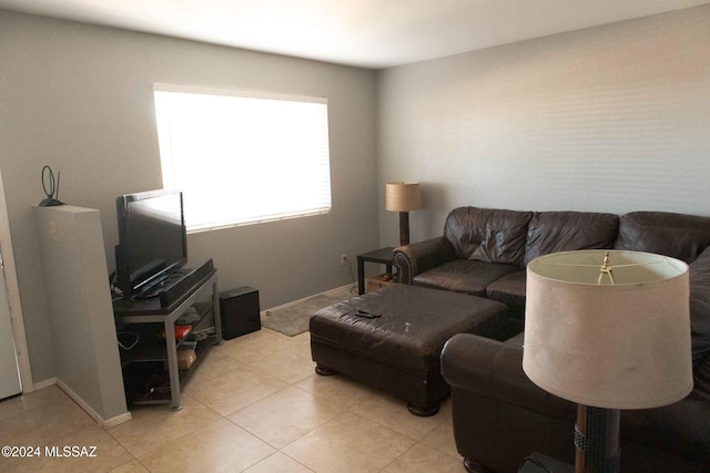 living room with light tile patterned flooring