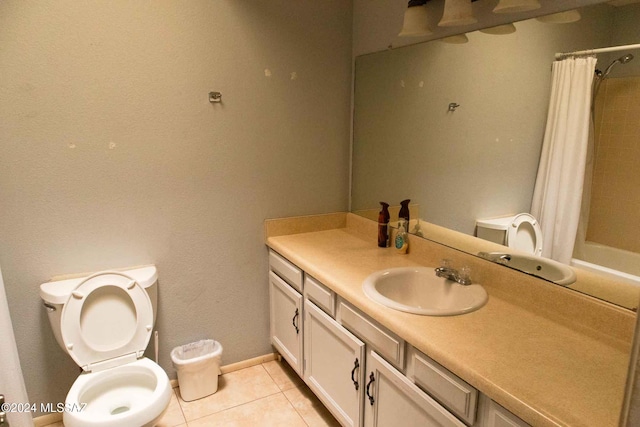 full bathroom featuring vanity, tile patterned flooring, shower / bath combo, and toilet