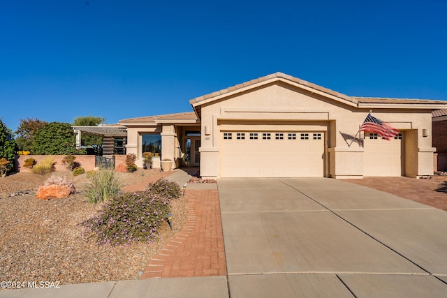 view of front of home with a garage