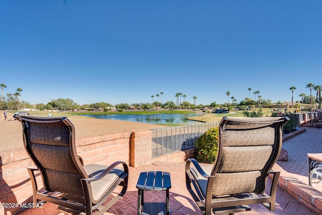 view of patio featuring a water view