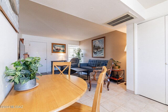 dining room featuring light tile patterned floors