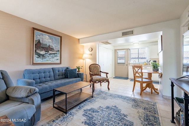 living room featuring light tile patterned floors