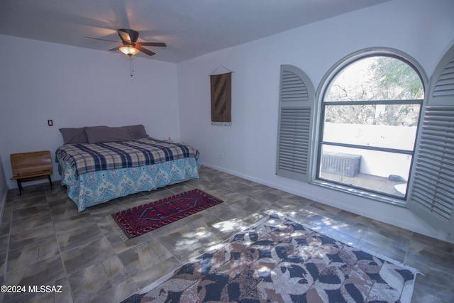 bedroom featuring ceiling fan