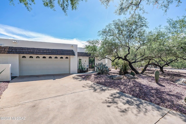 view of front of house with a garage