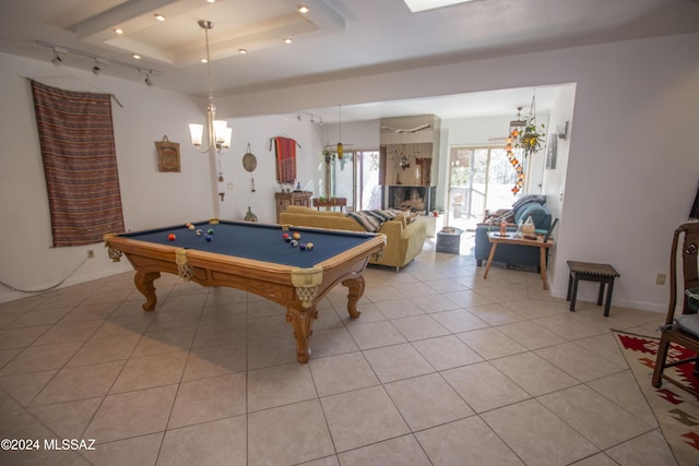 recreation room with light tile patterned floors, pool table, and a tray ceiling