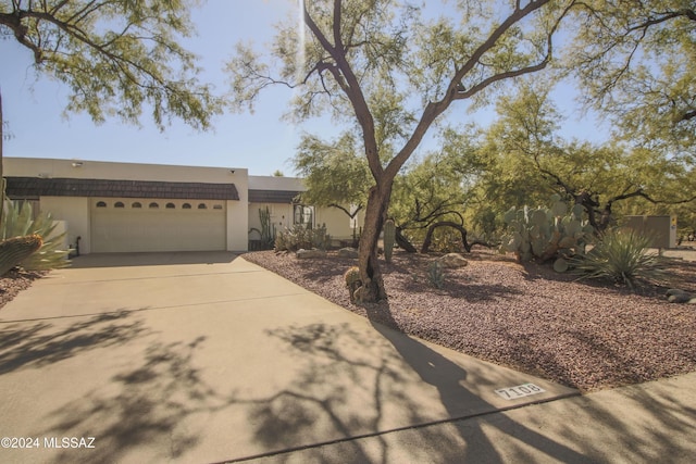 view of front of home with a garage