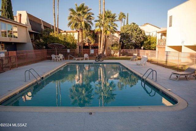 view of swimming pool featuring a patio area