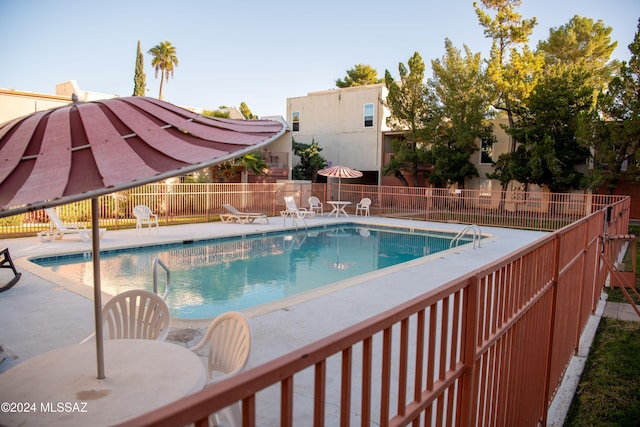 view of pool featuring a patio