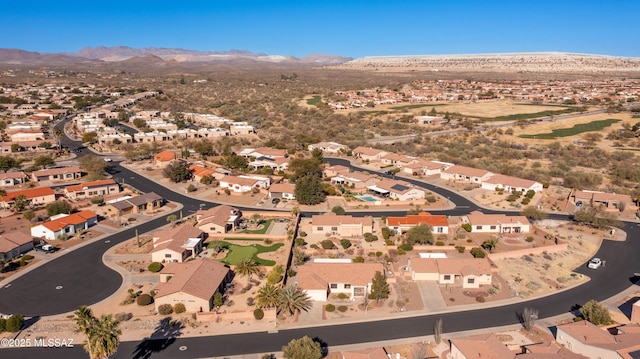 drone / aerial view featuring a mountain view