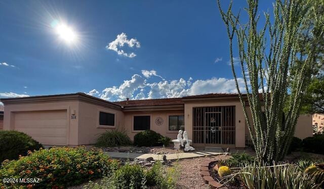 view of front of home featuring a garage