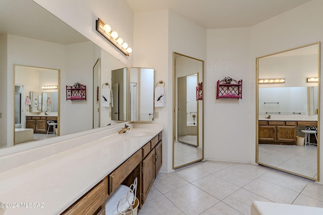 bathroom with vanity and tile patterned flooring