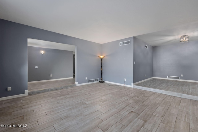 empty room featuring light hardwood / wood-style floors