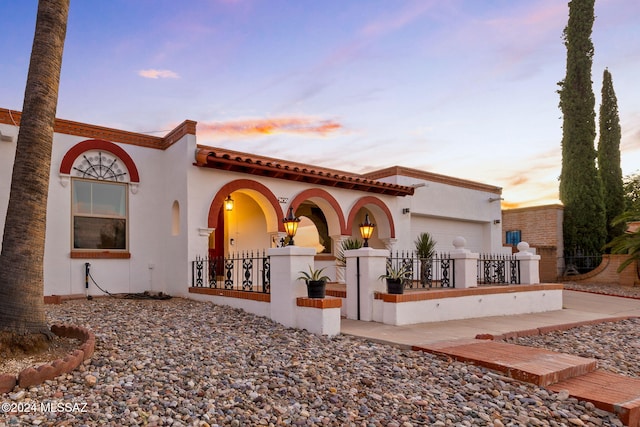 view of front of house with a garage