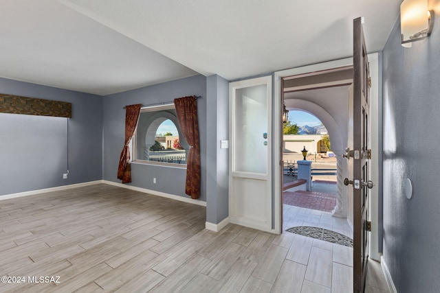 foyer entrance featuring light wood-type flooring