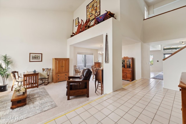 entryway featuring light tile patterned floors, plenty of natural light, and an inviting chandelier