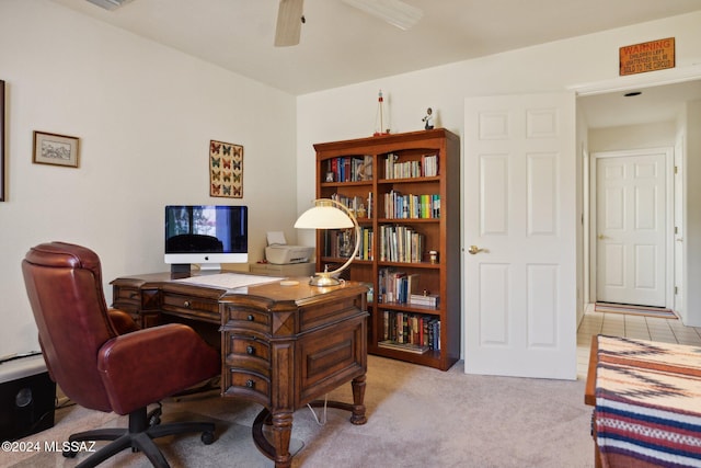 office area featuring ceiling fan and light colored carpet