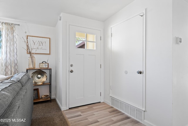 entrance foyer with light wood-type flooring