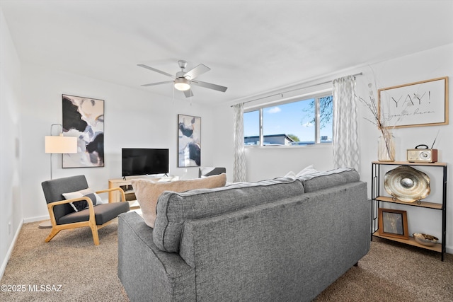 living room with carpet flooring and ceiling fan