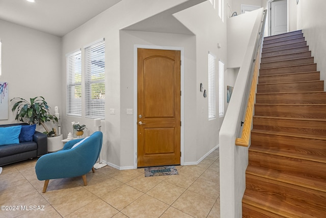 foyer with light tile patterned floors
