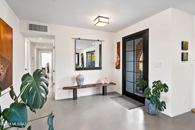 foyer featuring concrete flooring