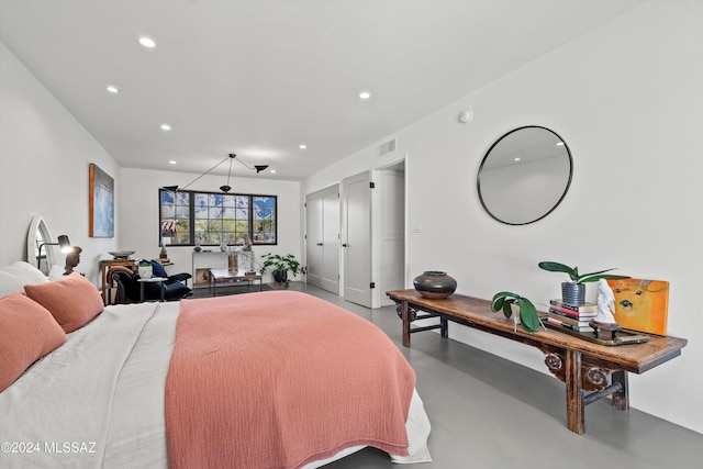 bedroom with concrete floors