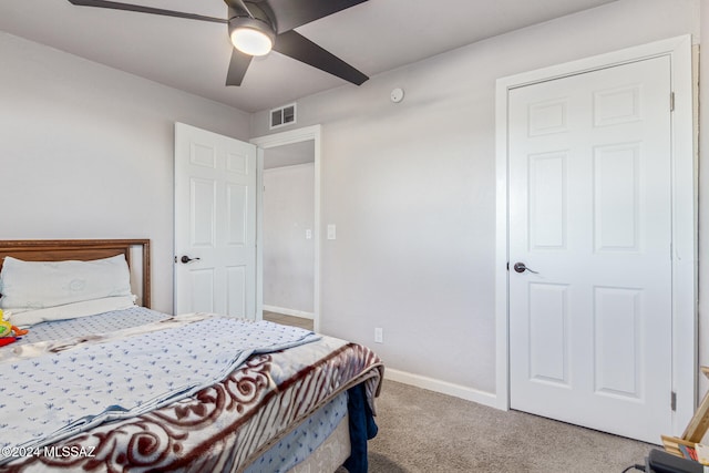 bedroom featuring ceiling fan and carpet floors