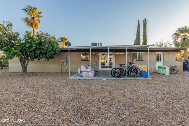 rear view of house featuring a patio area