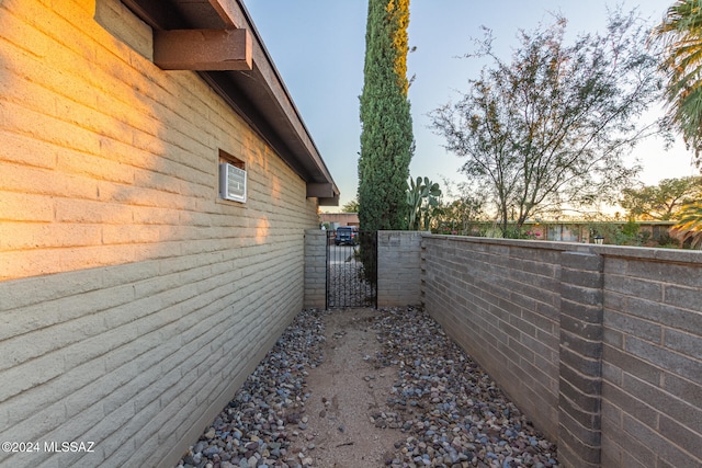 view of property exterior at dusk