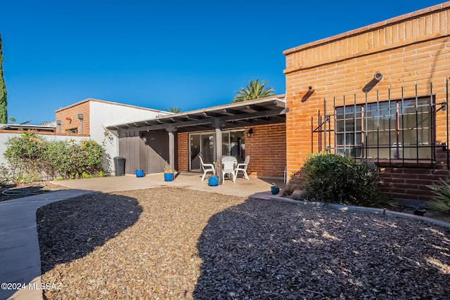 rear view of property with a patio