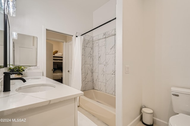 full bathroom with shower / bath combo, vanity, and toilet