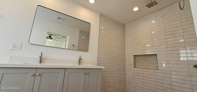 bathroom with vanity and ceiling fan