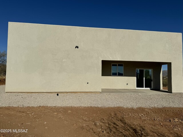 rear view of property with a patio area