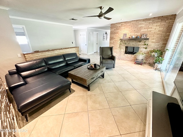 tiled living room with ceiling fan