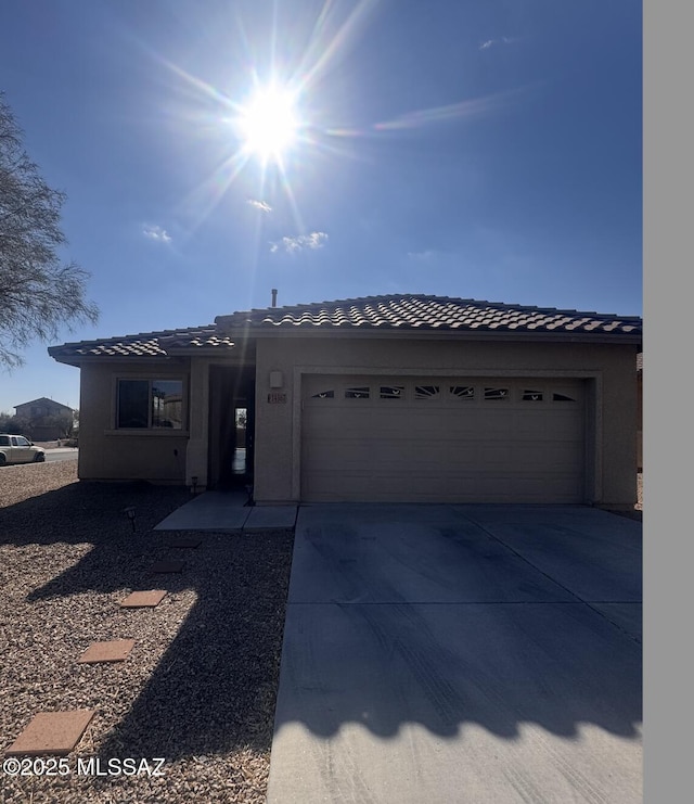 view of front of property featuring a garage