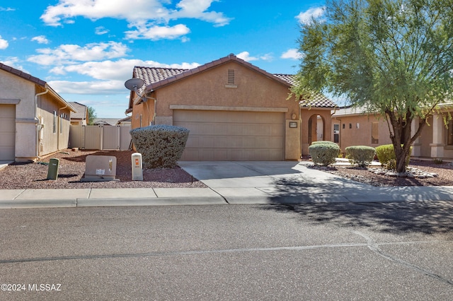 view of front of home with a garage