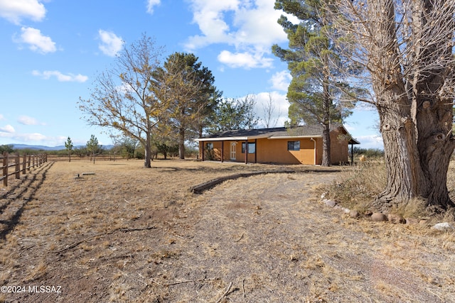 exterior space featuring a rural view