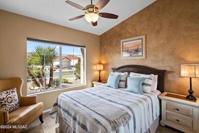 bedroom featuring vaulted ceiling and ceiling fan