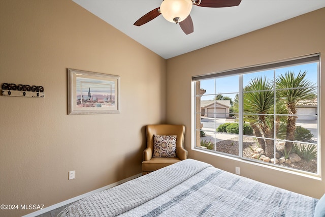 bedroom featuring lofted ceiling and ceiling fan