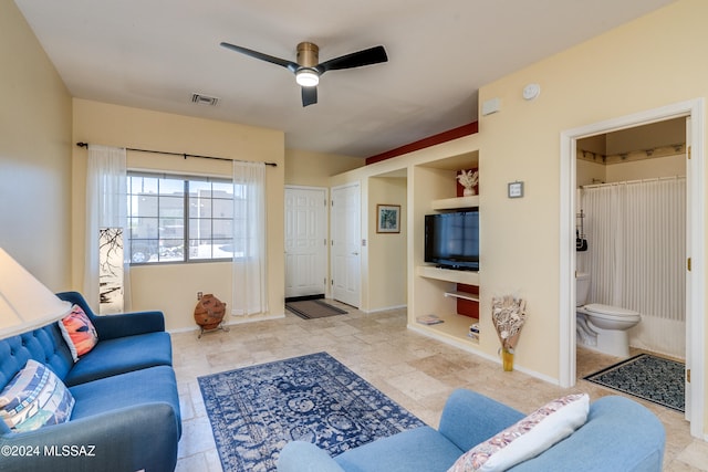 living room with ceiling fan