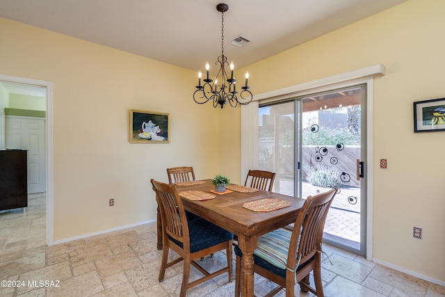 dining room with a chandelier