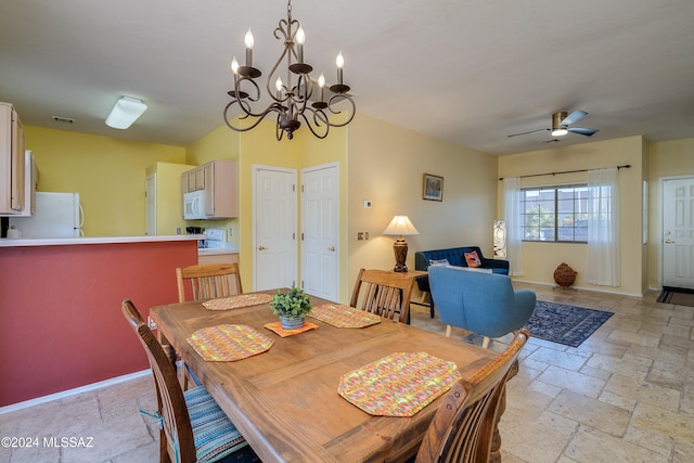 dining area with ceiling fan with notable chandelier