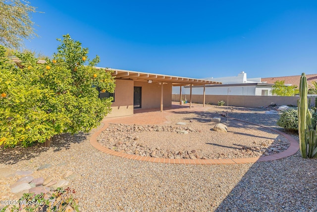 view of yard with a patio area and fence