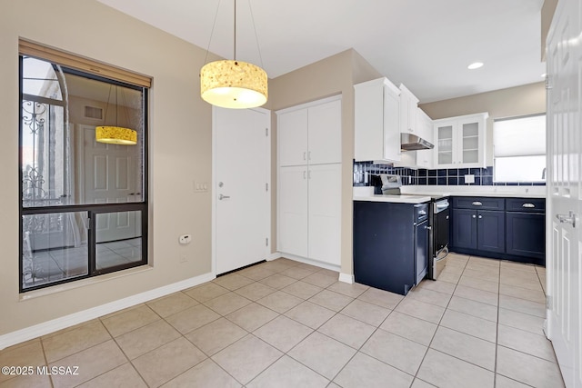 kitchen with stainless steel electric range oven, light countertops, glass insert cabinets, white cabinets, and under cabinet range hood