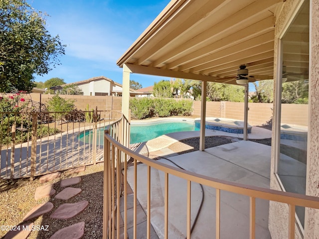 view of pool featuring a patio area and ceiling fan