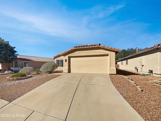 view of front of home featuring a garage