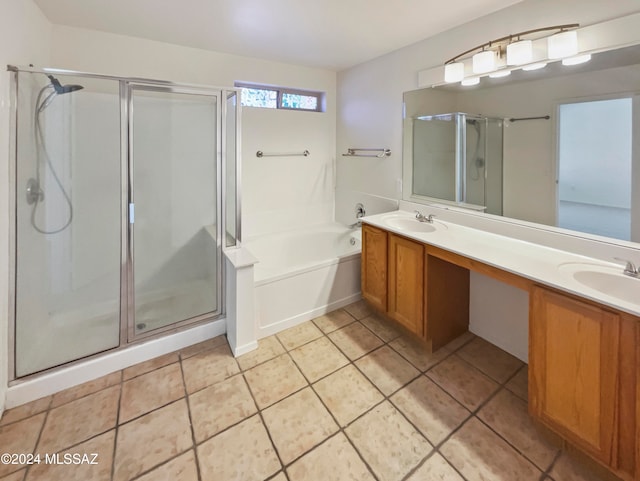 bathroom with shower with separate bathtub, tile patterned floors, and vanity