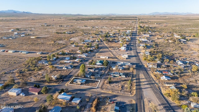 drone / aerial view featuring a mountain view